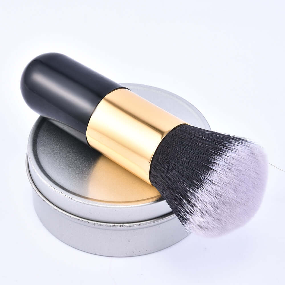 Face makeup brush with soft dense bristles on a neutral background
