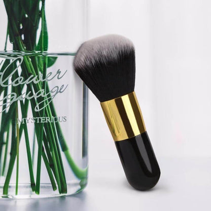 Face makeup brush with soft dense bristles on a neutral background